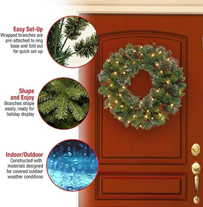 National Tree Company Pre-Lit Artificial Christmas Wreath, Green, Crestwood Spruce, White Lights, Decorated with Pine Cones, Berry Clusters, Christmas Collection, 24 Inches