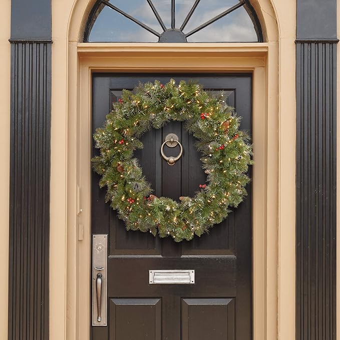 National Tree Company Pre-Lit Artificial Christmas Wreath, Green, Crestwood Spruce, White Lights, Decorated with Pine Cones, Berry Clusters, Frosted Branches, Christmas Collection, 36 Inches